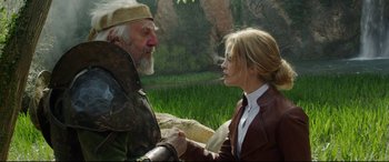 Movie still from “The Man Who Killed Don Quixote” (2018), directed by Terry Gilliam – An old man and a young woman holding hands; Medium shot, Over the shoulder angle