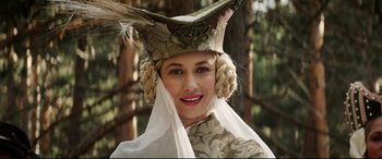 Movie still from “The Man Who Killed Don Quixote” (2018), directed by Terry Gilliam – A woman with a hat on her head; Close Up shot, Over the shoulder angle