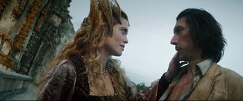 Movie still from “The Man Who Killed Don Quixote” (2018), directed by Terry Gilliam – A person with long hair; Close Up shot, Over the shoulder angle