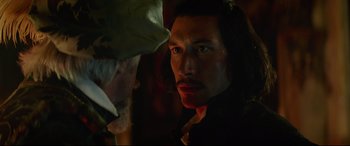 Movie still from “The Man Who Killed Don Quixote” (2018), directed by Terry Gilliam – A person looking at another person; Close Up shot, Over the shoulder angle
