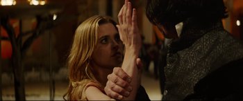 Movie still from “The Man Who Killed Don Quixote” (2018), directed by Terry Gilliam – A woman with her hands up in the air and a man with his hands on her; Close Up shot, Low angle