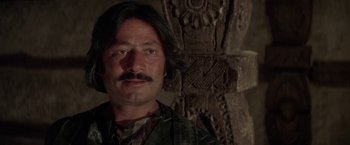 Movie still from “The Man Who Would Be King” (1975), directed by John Huston – A person with a mustache; Close Up shot, Low angle