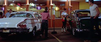 Movie still from “American Graffiti” (1973), directed by George Lucas – Wide shot, Low angle