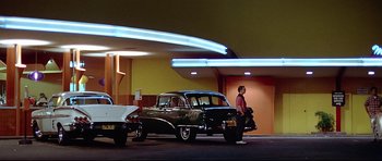 Movie still from “American Graffiti” (1973), directed by George Lucas – Extreme Wide shot, Low angle