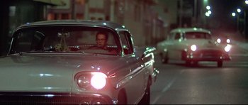 Movie still from “American Graffiti” (1973), directed by George Lucas – Wide shot, Low angle