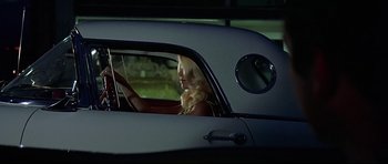 Movie still from “American Graffiti” (1973), directed by George Lucas – Wide shot, Low angle