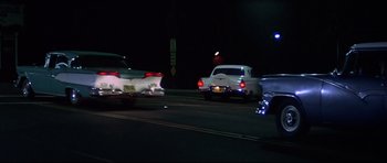 Movie still from “American Graffiti” (1973), directed by George Lucas – Wide shot, Low angle