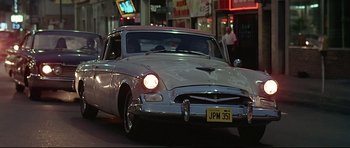 Movie still from “American Graffiti” (1973), directed by George Lucas – Wide shot, Low angle