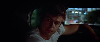 Movie still from “American Graffiti” (1973), directed by George Lucas – Close Up shot, Over the shoulder angle