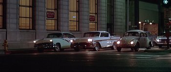 Movie still from “American Graffiti” (1973), directed by George Lucas – Wide shot, Low angle