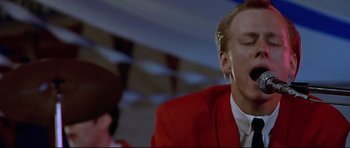 Movie still from “American Graffiti” (1973), directed by George Lucas – Close Up shot, Low angle