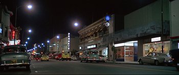Movie still from “American Graffiti” (1973), directed by George Lucas – Extreme Wide shot, Low angle