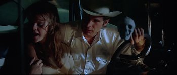 Movie still from “American Graffiti” (1973), directed by George Lucas – Close Up shot, Over the shoulder angle