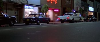 Movie still from “American Graffiti” (1973), directed by George Lucas – Wide shot, Low angle