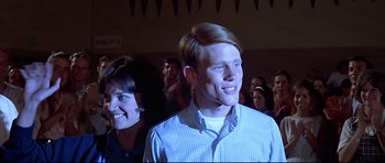 Movie still from “American Graffiti” (1973), directed by George Lucas – Medium shot, Low angle