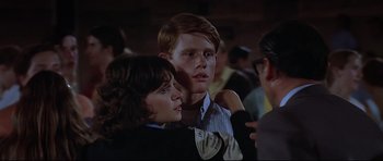 Movie still from “American Graffiti” (1973), directed by George Lucas – Close Up shot, Over the shoulder angle