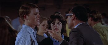 Movie still from “American Graffiti” (1973), directed by George Lucas – Medium shot, Over the shoulder angle