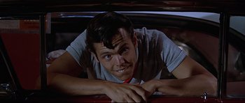 Movie still from “American Graffiti” (1973), directed by George Lucas – Close Up shot, Low angle