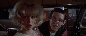 Movie still from “American Graffiti” (1973), directed by George Lucas – Close Up shot, Over the shoulder angle