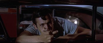 Movie still from “American Graffiti” (1973), directed by George Lucas – Close Up shot, Low angle