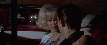 Movie still from “American Graffiti” (1973), directed by George Lucas – Close Up shot, Over the shoulder angle