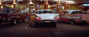 Movie still from “American Graffiti” (1973), directed by George Lucas – Wide shot, Low angle