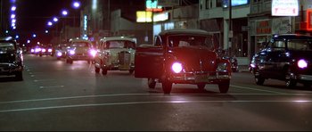 Movie still from “American Graffiti” (1973), directed by George Lucas – Wide shot, Low angle