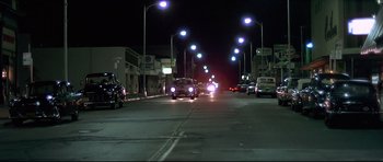 Movie still from “American Graffiti” (1973), directed by George Lucas – Extreme Wide shot, Low angle