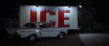 Movie still from “American Graffiti” (1973), directed by George Lucas – Wide shot, Low angle