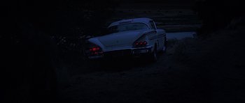 Movie still from “American Graffiti” (1973), directed by George Lucas – Wide shot, Low angle