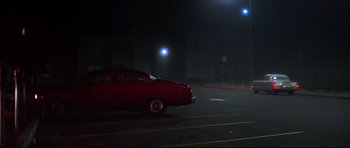 Movie still from “American Graffiti” (1973), directed by George Lucas – Wide shot, High angle