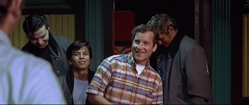 Movie still from “American Graffiti” (1973), directed by George Lucas – Medium shot, Over the shoulder angle