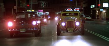 Movie still from “American Graffiti” (1973), directed by George Lucas – Wide shot, Low angle