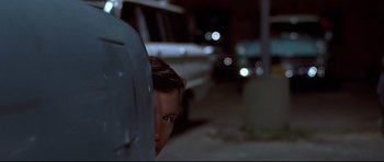 Movie still from “American Graffiti” (1973), directed by George Lucas – Close Up shot, Over the shoulder angle
