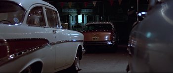 Movie still from “American Graffiti” (1973), directed by George Lucas – Wide shot, Low angle