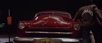 Movie still from “American Graffiti” (1973), directed by George Lucas – Wide shot, Low angle