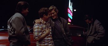 Movie still from “American Graffiti” (1973), directed by George Lucas – Medium shot, Over the shoulder angle