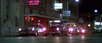 Movie still from “American Graffiti” (1973), directed by George Lucas – Extreme Wide shot, Low angle