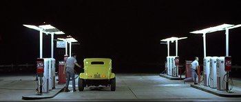 Movie still from “American Graffiti” (1973), directed by George Lucas – Wide shot, Low angle