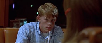 Movie still from “American Graffiti” (1973), directed by George Lucas – Close Up shot, Over the shoulder angle