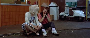 Movie still from “American Graffiti” (1973), directed by George Lucas – Medium shot, Over the shoulder angle