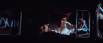 Movie still from “American Graffiti” (1973), directed by George Lucas – Close Up shot, Over the shoulder angle