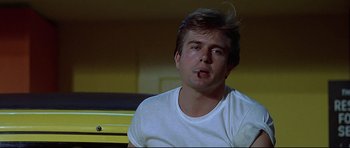 Movie still from “American Graffiti” (1973), directed by George Lucas – Close Up shot, Low angle