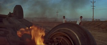 Movie still from “American Graffiti” (1973), directed by George Lucas – Wide shot, High angle