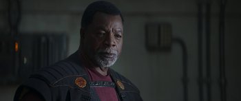 Movie still from “The Mandalorian” (2019), created by Jon Favreau – Close Up shot, Over the shoulder angle