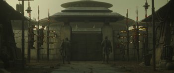 Movie still from “The Mandalorian” (2019), created by Jon Favreau – Wide shot, Low angle