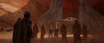 Movie still from “The Mandalorian” (2019), created by Jon Favreau – Wide shot, Low angle