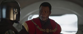 Movie still from “The Mandalorian” (2019), created by Jon Favreau – Close Up shot, Over the shoulder angle