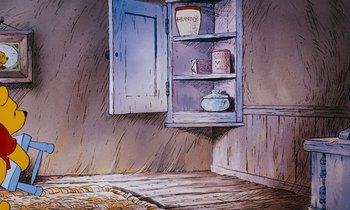 Movie still from “The Many Adventures of Winnie the Pooh” (1977), directed by John Lounsbery – An empty room with a cupboard and a wooden floor; Wide shot, Low angle