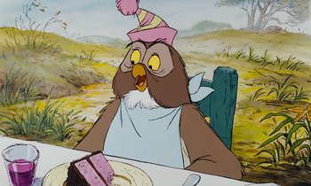 Movie still from “The Many Adventures of Winnie the Pooh” (1977), directed by John Lounsbery – An animated owl sitting at a table with a piece of cake on it; Medium shot, High angle